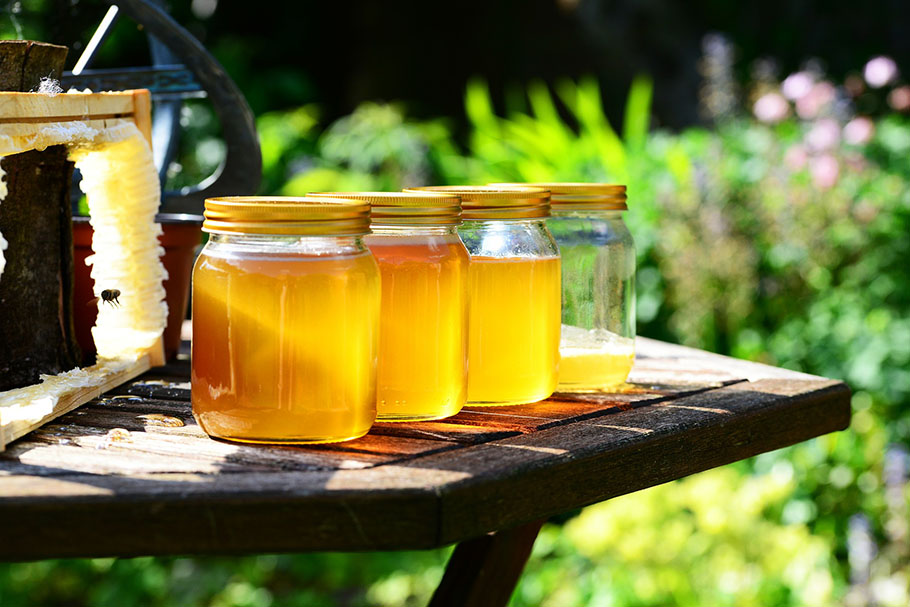 Jars Of Honey In The Sun